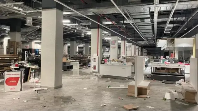 Алматыда тонолгон дүкөндөрдүн бири