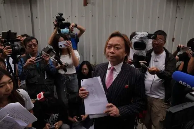 Lawrence Lau, one of di two activists wey Hong Kong court acquit 