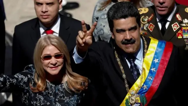 President of Venezuela, Nicolas Manduro and im wife pose for foto
