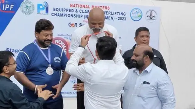 मेडल सेरेमनी के दौरान अमित सिन्हा