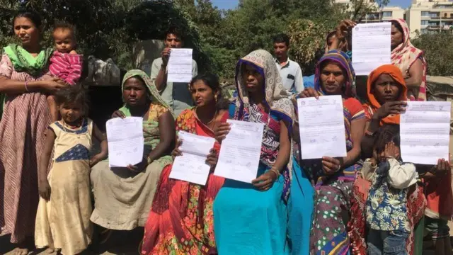 ઝૂંપડપટીના રહેવાસીઓની તસવીર