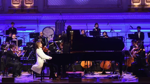 Yoshiki playing piano