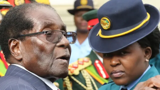 President Robert Mugabe leaves after delivering his State Of the Nation address at Parliament in Harare, Zimbabwe, December 6, 2016.
