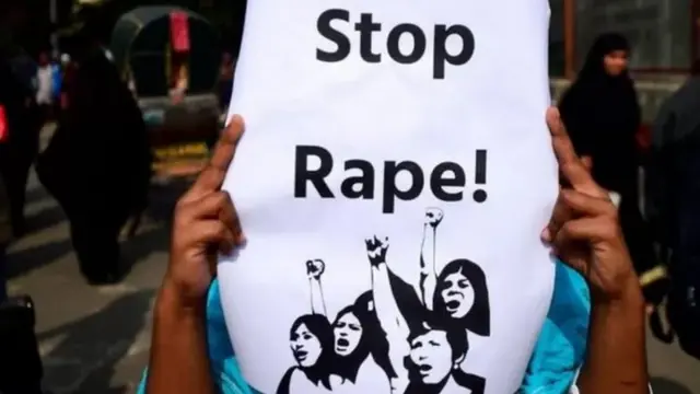stop rape placard