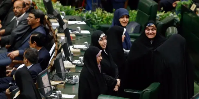 Iranian women lawmakers attend President Hassan Rouhani's swearing-in at the Iranian parliament in Tehran on 5 August 2017.