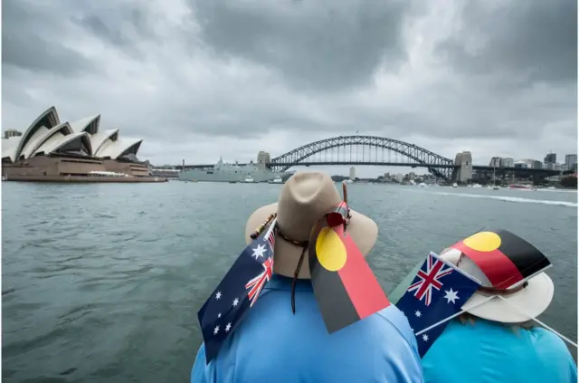 Participants wearing Australian and Aboriginal flags are seen aboard the ferry Emerald 6 during the annual Australia Day Ferrython on Sydney Harbour, Sydney, New South Wales, Australia, 26 January 2018. Australia Day is celebrated annually on 26 January to mark the arrival of the first British convict fleet in 1788. EPA/GLENN CAMPBELL AUSTRALIA AND NEW ZEALAND OUT