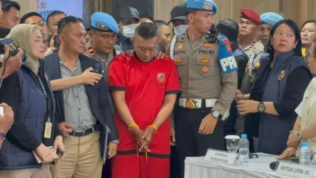 Tersangka Taufik Hidayat