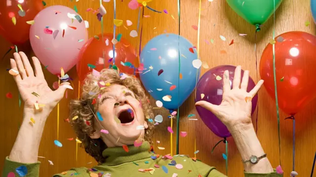 Senior woman at a party