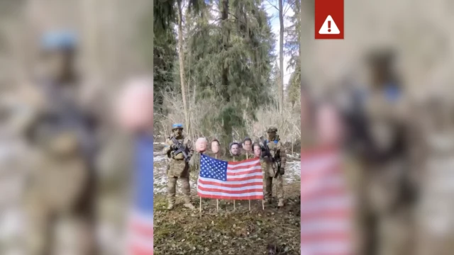 Kadar iz insceniranog videa koji prikazuje dvojicu muškaraca obučenih da izgledaju kao ukrajinski vojnici, pored američke zastave sa slikama Trampa, Maska i Džej Di Vensa na drvenim motkama