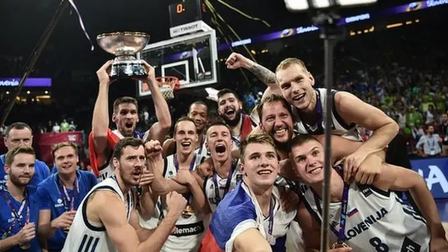 Slovenia's winning team celebrate their EuroBasket title