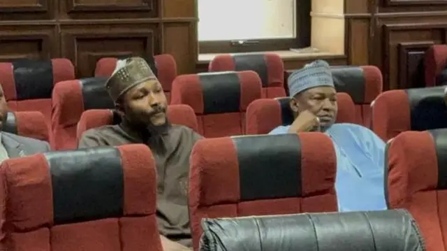 Former Nigeria Minister Of Justice Abubakar Malami (wear blue clothe and cap) and im son Abubakar Abdulaziz Malami (wear brown clothe and cap) for inside courtroom on Tuesday, 3 February, 2025