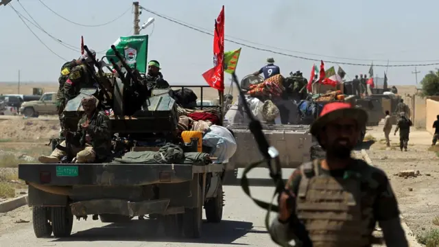 قوات الحشد الشعبي وقت دخولها المدينة