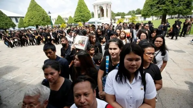 Mourners at the Grand Palace in Bangkok to pay their respects to the king who died on Thursday, 15 October 2016