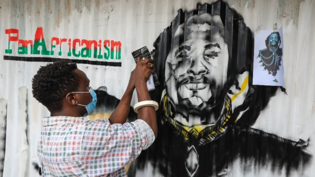 A graffiti artist paints Kenyan freedom fighter Dedan Kimathi Waciuri in an event organised by Kamukunji Youth Congress in Nairobi, Kenya - Tuesday 25 May 2021