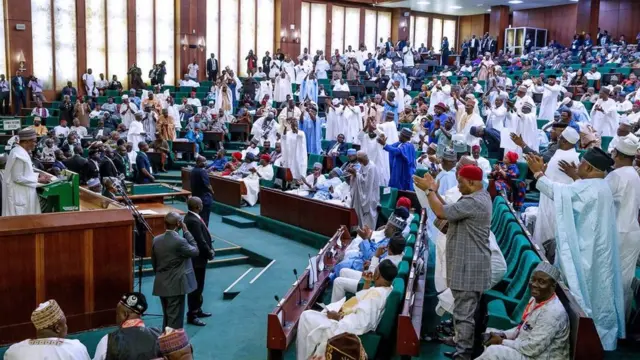 Buhari presnt 8.83 trillion naira 2019 budget wey big pass 8.26 trillion wey im present for 2018 but small pas di 9.12 im finally approve for June 2018