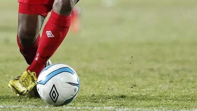 Person wey dey play football