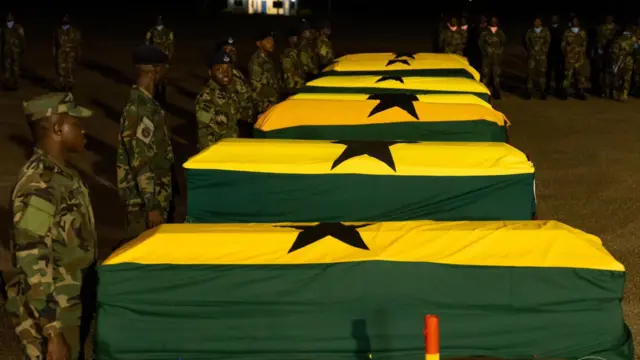 CASKETS of the eight victims lay on catafalques at the airforce base when they were airlifted from Kumasi to Accra on the night of the crash 