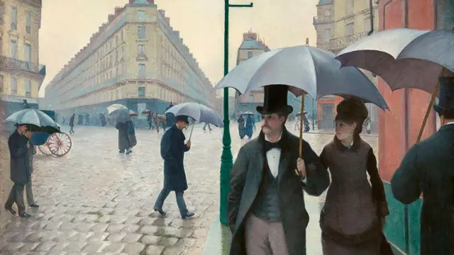 Parisinos caminando con paraguas