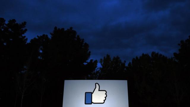 A lit sign at Facebook HQ