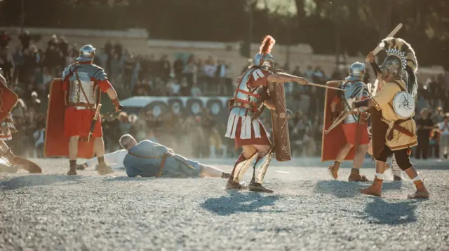 Ilustrasi pertarungan gladiator di Colosseum