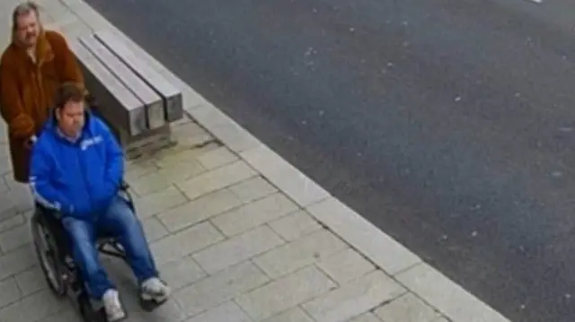 CCTV footage of John Siddell in a wheelchair