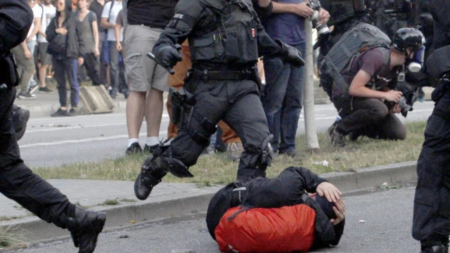 Riot police clash with protesters outside the G20 summit in Hamburg in 2017