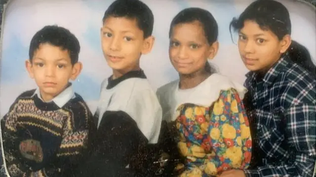 Ruqsana Begum as a child with her sister and two brothers