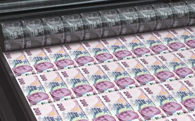Darphaneye benzer bir yerde 200 tl banknotlar basılıyor, stok görsel. 