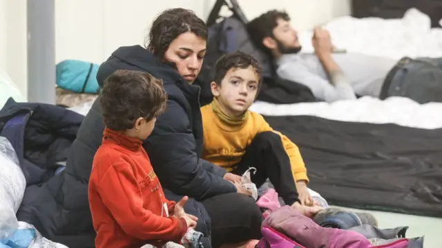 Migrants inside the warehouse in Belarus