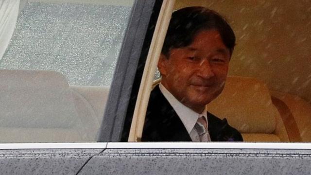 Emperor Naruhito arrives at the Imperial Palace on Tuesday