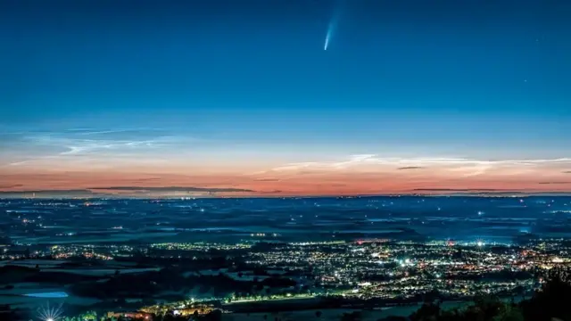 Noctilucent clouds float in the night sky as the Neowise comet streaks past in Wellington, Telford. Photo by Weather Watcher Bigolives.