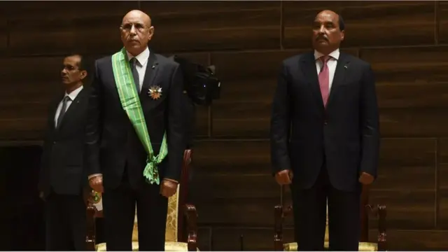 L'actuel président en compagnie de son prédécesseur