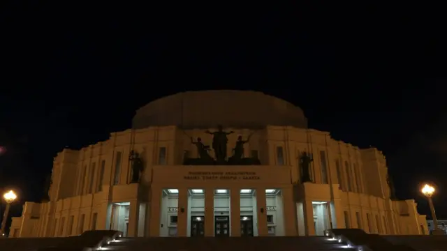 The Bolshoi Opera and Ballet Theater of Belarus is seen with lights off during the "Earth Hour" in Minsk, Belarus