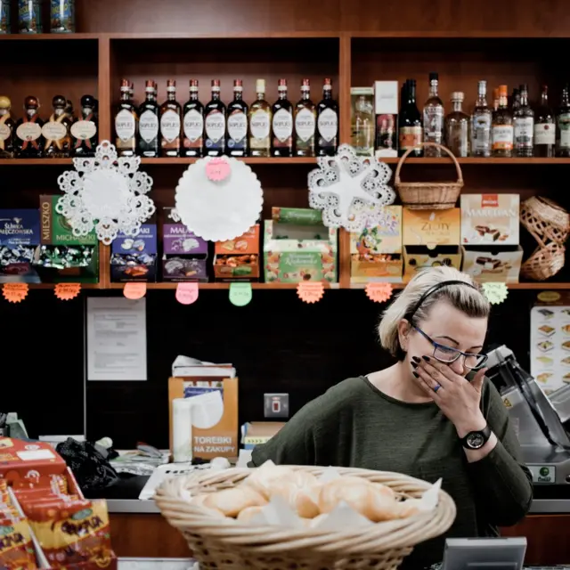 Agata Zyska Olejniczak, Polish. She runs a food shop.