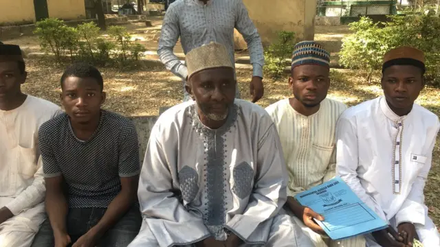 Alhaji Ibrahim Sharifai wit some of im students