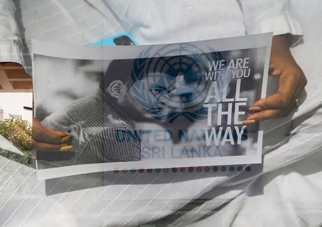 Anti-government demonstrators stage a Satyagraha protest against the government in front of the United Nations office, asking the United Nations to force the government to release the leader of the Inter-University Students' Union Wasantha Mudalige and Reverend Galvewa Siridhamma Thero, in Colombo on November 11, 2022. (Photo by Pradeep Dambarage/NurPhoto via Getty Images)