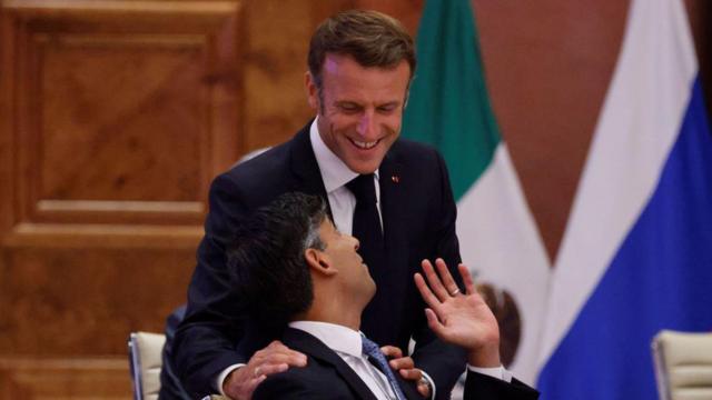 Emmanuel Macron y Rishi Sunak