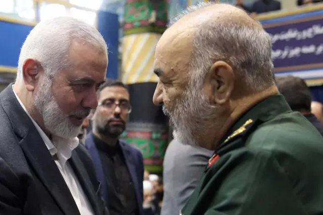 Ismail Haniyeh greeting IRGC commander Hossein Salami