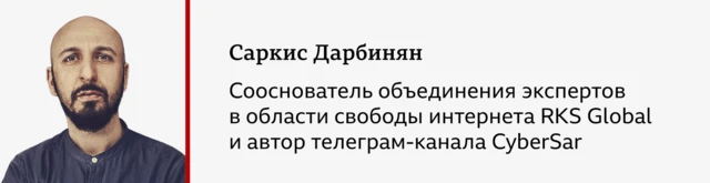 Портрет наголо обритого мужчины с усами, бородой и в темно-синей рубашке.