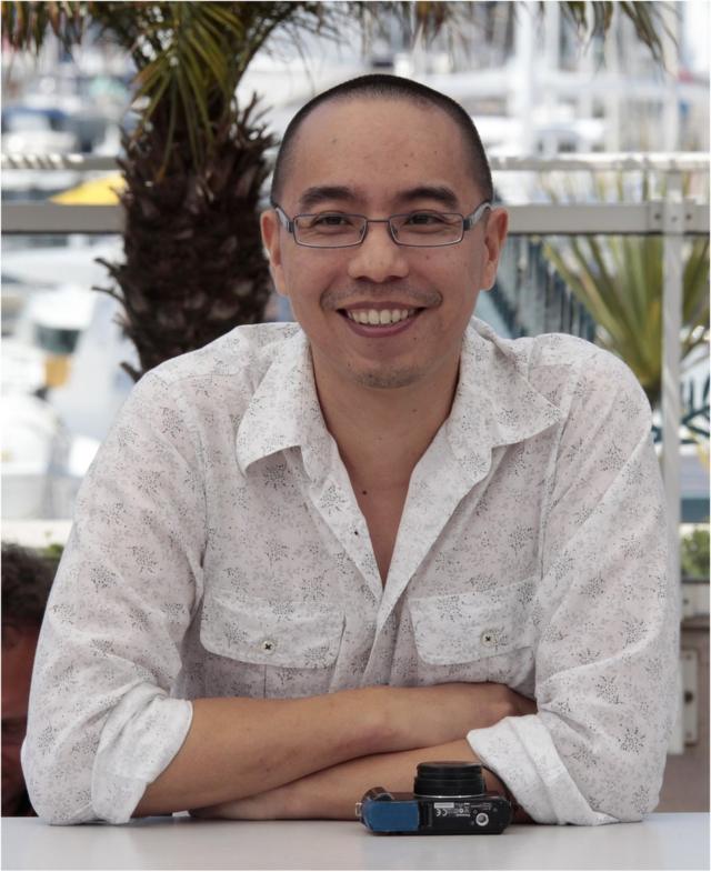 Director Apichatpong Weerasethakul poses during a photocall for the film Lung Boonmee Raluek Chat (Uncle Boonmee Who Can Recall his Past Lives) in competition at the 63rd Cannes Film Festival May 21, 2010. Nineteen films are competing for the prestigious Palme d"Or which will be awarded on May 23. REUTERS/Vincent Kessler (
