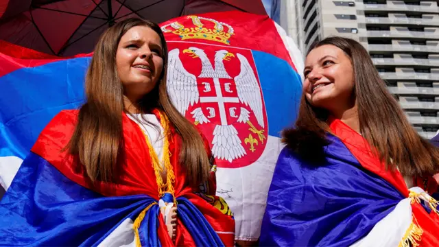 Fans of Serbian tennis player Novak Djokovic show their support for his legal battle over his visa to enter the country and play in the Australian Open, outside the Federal Court of Australia in Melbourne, Australia, 10 January 2022
