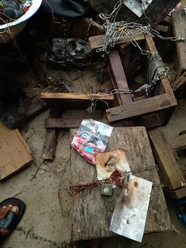 Some pipo fotos dey chained and nailed down ontop locally made chairs for di man house