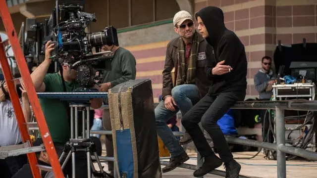 الممثل كريستيان سلايتر، والممثل رامي مالك