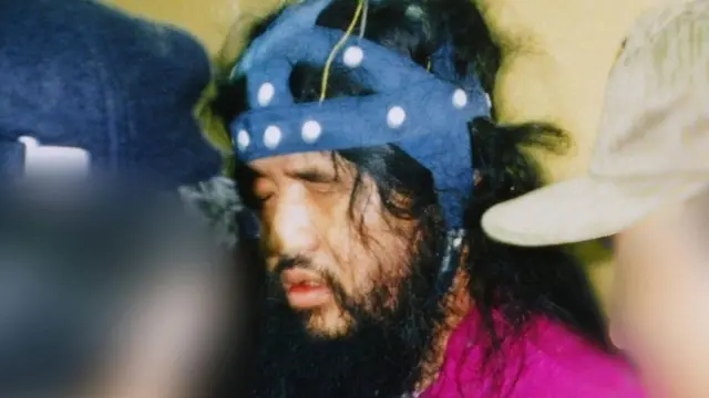 file picture taken on May 16, 1995 shows doomsday cult leader Shoko Asahara