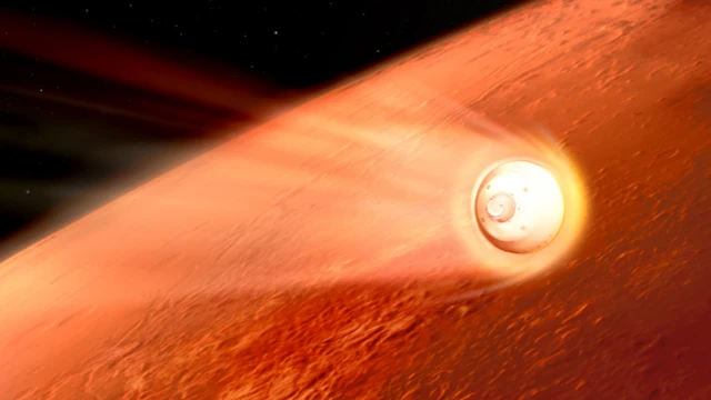 ภาพจำลองยานนำส่งหุ่นยนต์ "เพอร์เซเวียแรนซ์" กำลังพุ่งเข้าสู่ชั้นบรรยากาศของดาวอังคาร