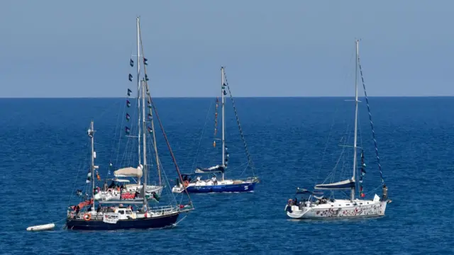 File photo showing four yachts taking part in the Gaza-bound Global Sumud Flotilla departing the Porto Xiphonio Augusta, Sicily, Italy (26 April 2026)