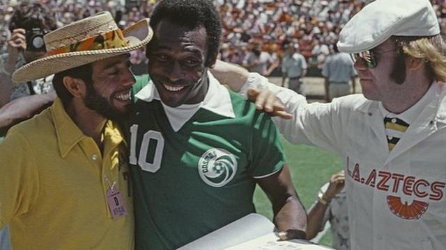 Pele, pictured with Brazilian musician Sergio Mendes and Elton John