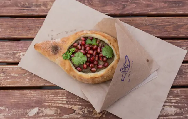 Vegan aubergine and pomegranate adzharuli at vegan Georgian cafe Dze Bistro