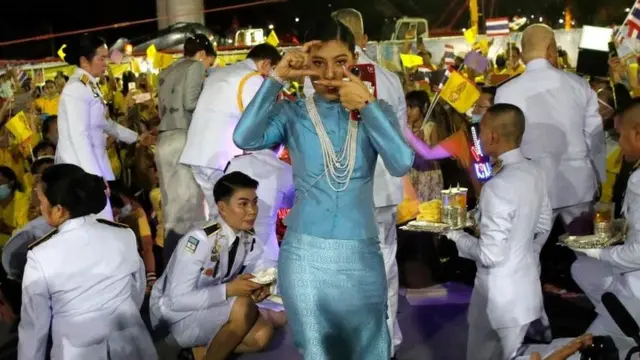 Thai Princess Sirivannavari Nariratana gestures towards royalists during a public appearance of royal family members outside the Grand Palace in Bangkok, Thailand, 01 November 2020.