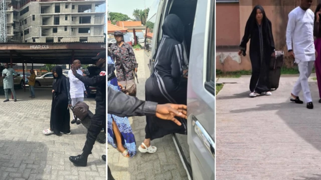 Bobrisky dragging box and bag wearing black outfit wit black veil.